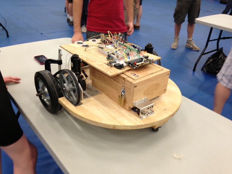 The student created electrical units for the robots, which then maneuvered a course completely on their own to put out fake, cardboard fires.