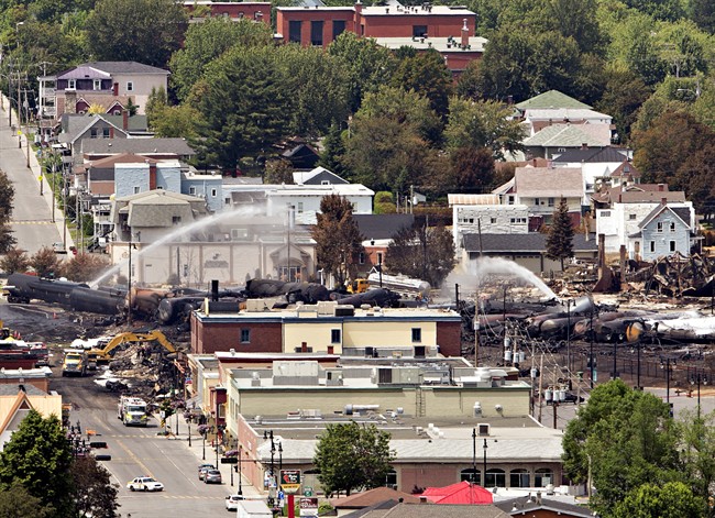 Searchers dig through the rubble for victims of the inferno in Lac-Megantic, Que., Monday, July 8, 2013.