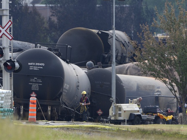 Clean up continues at the scene of the Lac-Mégantic, Que. runaway train derailment and explosion on Tuesday July 9, 2013. 