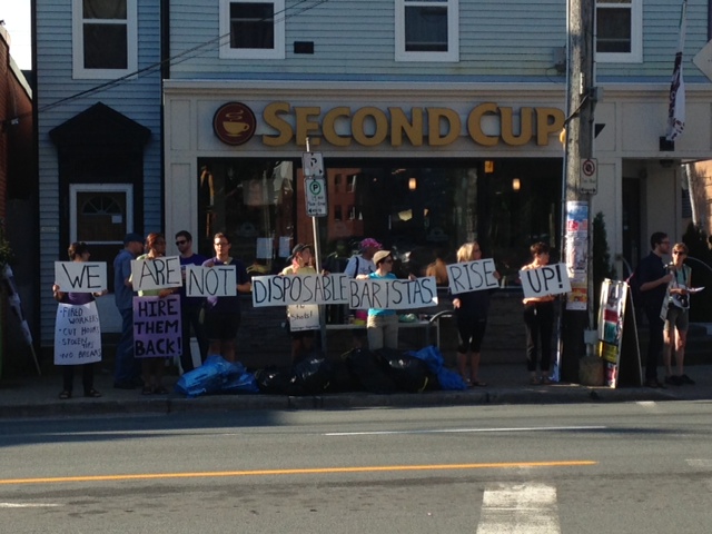 About a dozen people gathered in front of a Halifax coffee shop Monday morning to protest workers who were allegedly fired for starting a union.