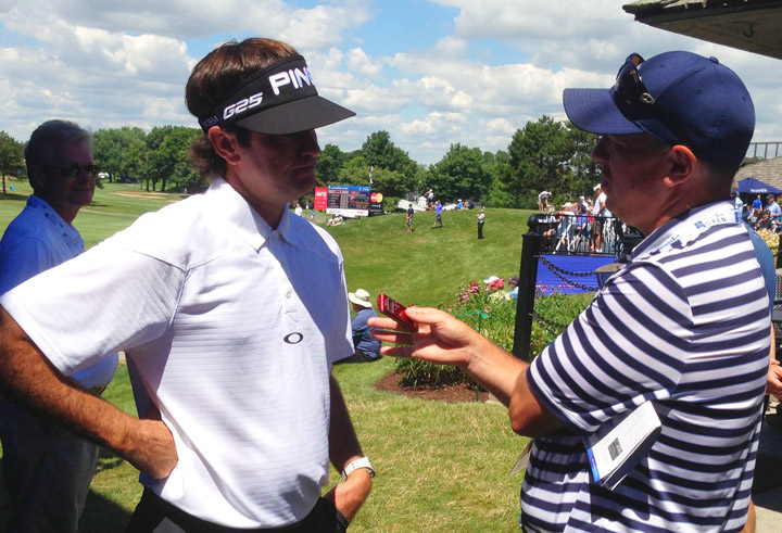 Robert Thompson interviewing Bubba Watson, left.