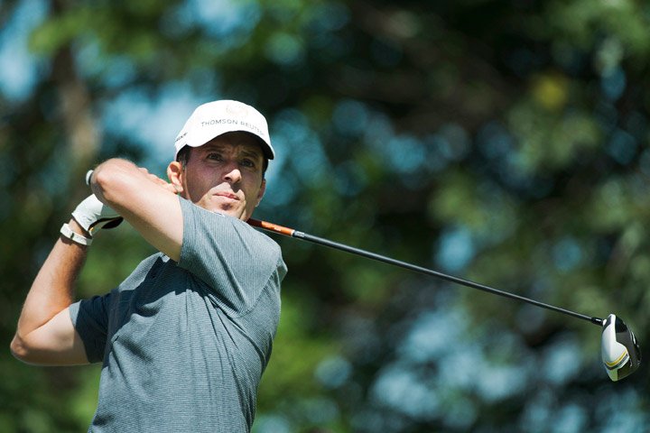 Mike Weir watches his tee shot on the 10th hole during the Canadian Open Pro-Am in Oakville, Ont., on Wednesday, July 24, 2013.