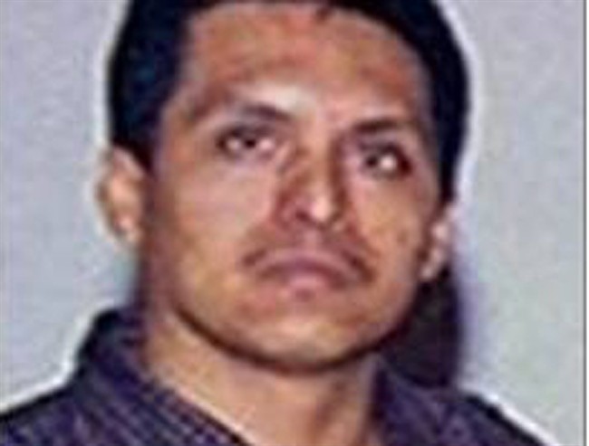 FILE - This undated file image downloaded from the Mexican Attorney General's Office rewards program website, shows the leader of Zetas drug cartel, Miguel Angel Trevino Morales, alias “Z-40”. 
