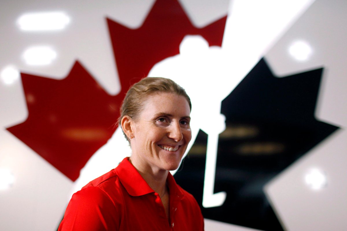 Canadian National Women's hockey player Hayley Wickenheiser, from Shaunavon, Sask., speaks to a reporter a news conference in Calgary, Alta., Monday, May 27, 2013.