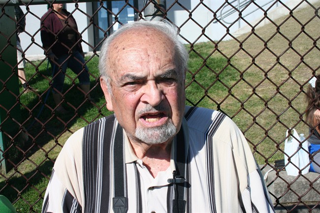 Joe Black, 87, speaks prior to a commemorative baseball game at Christie Pits ballpark in Toronto on Sunday, August 11, 2013.