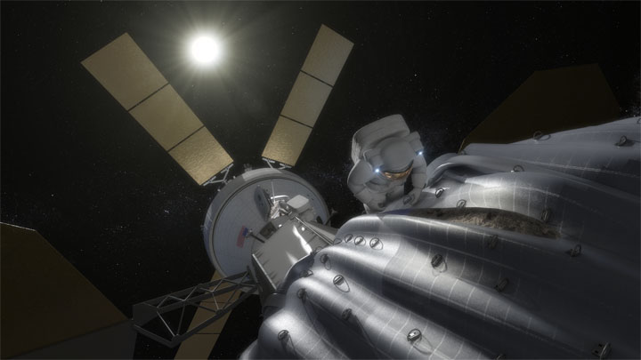 This concept image shows an astronaut preparing to take samples from a captured asteroid after it has been relocated to a stable orbit in the Earth-moon system. 