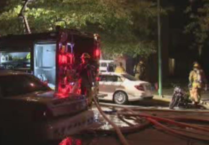 Two people were injured in an early morning fire in a Burnaby apartment building on August 21, 2013.