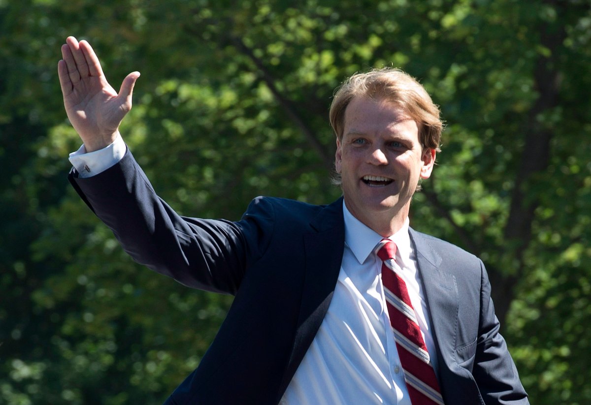 Chris Alexander waves as he arrives for a federal cabinet shuffle at Rideau Hall in Ottawa on Monday, July 15, 2013. Alexander was sworn in as the minister of citizenship and immigration. THE CANADIAN PRESS/Adrian Wyld.