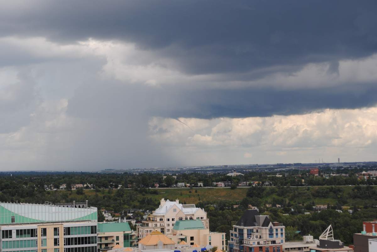 A photo of ominous looking clouds over downtown Calgary, on Monday August 5th, 2013. 