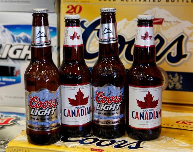 Coors Light and Molson Canadian bottles of beer on display in Denver.