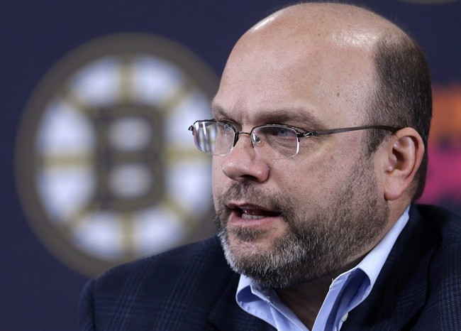Boston Bruins general manager Peter Chiarelli responds to a question from a reporter during a news conference at the TD Garden before a scheduled NHL team hockey practice in Boston, Sunday, Jan. 13, 2013. 