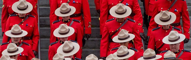 RCMP officers in Red Serge are pictured.