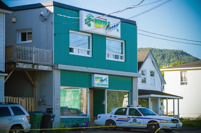 An RCMP cruiser sits outside Reptile Ocean in Campbellton, N.B., on August 6, 2013.