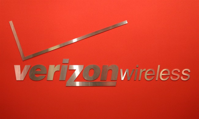 In this Feb. 10, 2011 photo, a Verizon Wireless sign is displayed in one of its stores in New York.