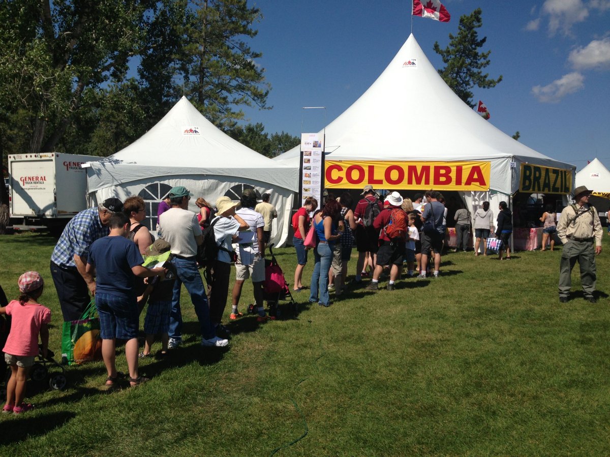 People line up at the 2013 Edmonton Heritage Festival, Saturday, August 3, 2013. 