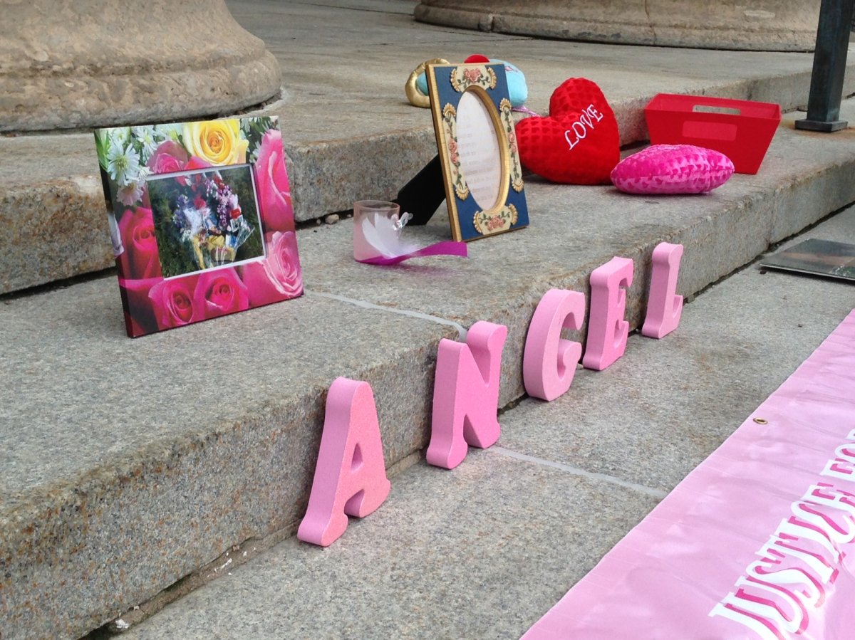 Friends and family of Hillary Angel Wilson leave items in memorial on the steps of the Manitoba Legislature on August 20, 2013.