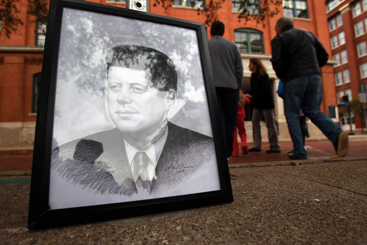A pencil drawing of John F. Kennedy sits in Dealey Plaza during the 48th anniversary of his assassination on November 22, 2011 in Dallas, Texas. 