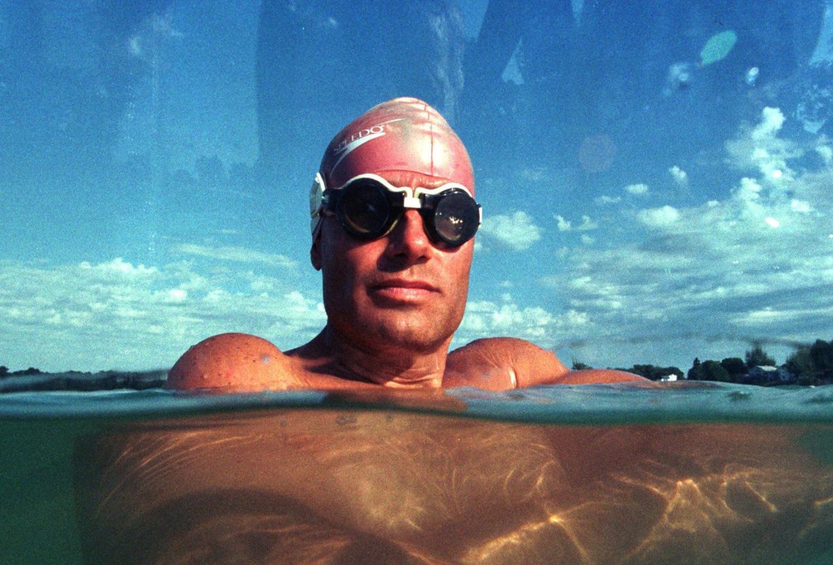 FILE -- Jim Dreyer, shown nearly submerged in Green Lake in Leighton Township, Mich., Wednesday, July 28, 1999, successfully completed a swim across Lake Michigan Monday, Sept. 6, 1999 landing at Point Clark, Ont., just south of Kincardin. His spokesperson said it took Dreyer about 40 hours to swim from Port Hope, Mich., to Point Clark. 