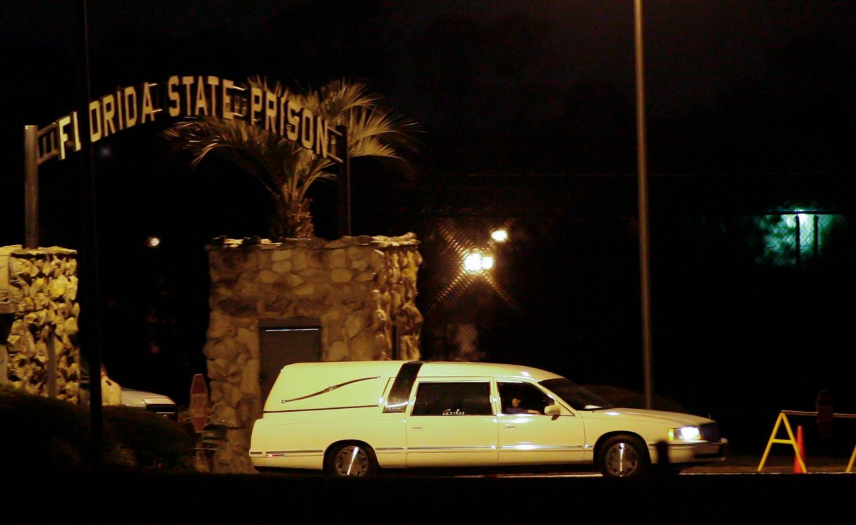 A hearse leaves Florida State Prison in Raiford, Fla. Tuesday, Oct. 23, 2012. The 11th U.S. Circuit Court of Appeals on Tuesday night blocked the scheduled execution of 64-year-old John Errol Ferguson, who was convicted 34 years ago of eight slayings that jolted South Florida in the 1970s. Florida officials immediately asked the U.S. Supreme Court to lift the stay. 