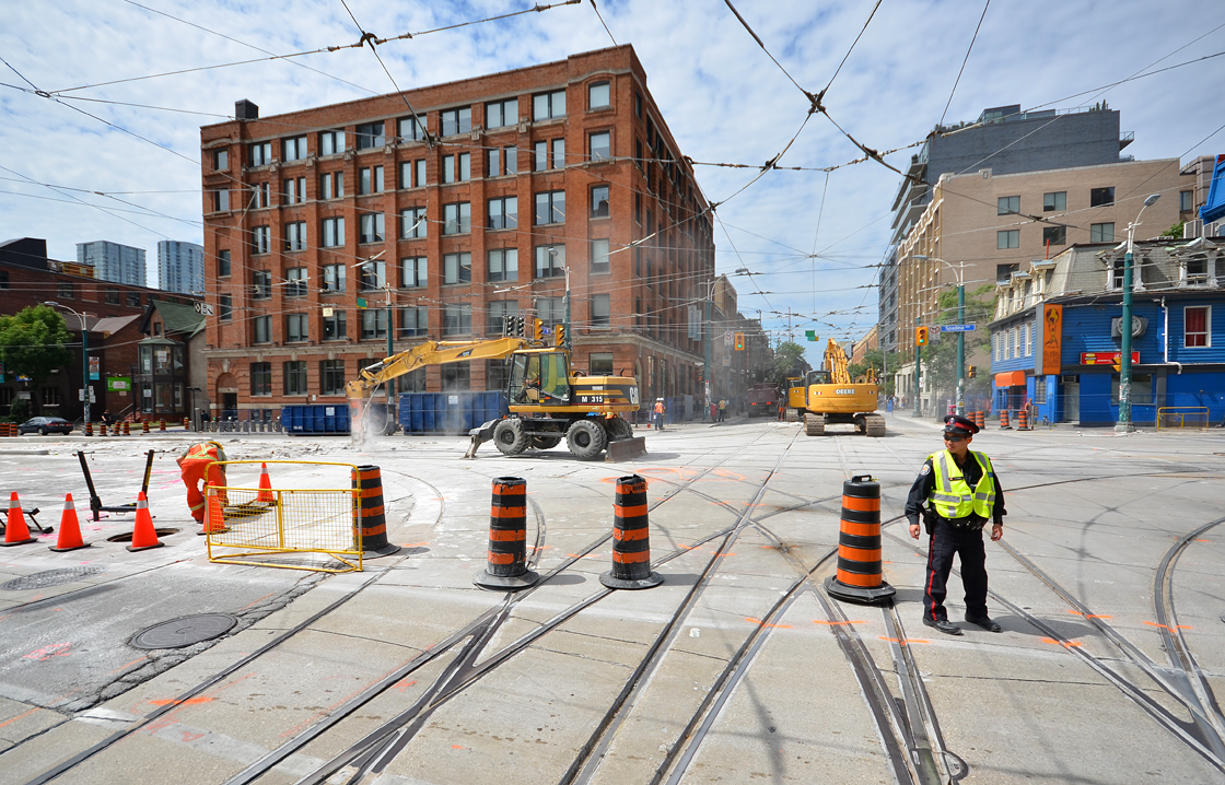 Track replacement work at the intersection of Spadina and King Street on August 06, 2013.
