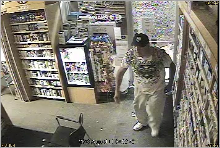 Security video shows a suspect breaking in to a downtown business early Sunday morning.