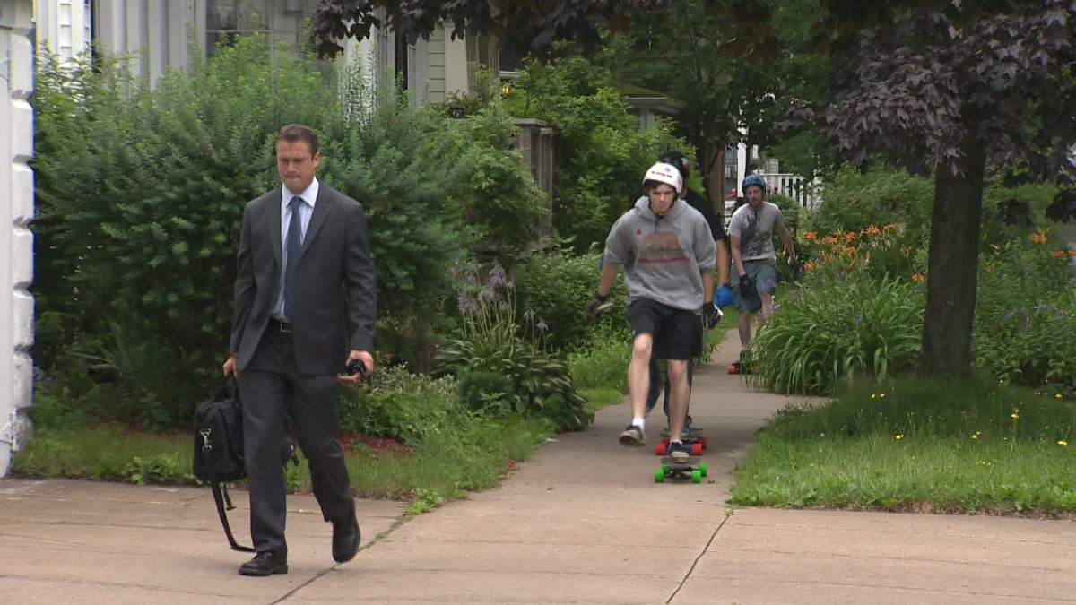 File photo of a young man longboarding.