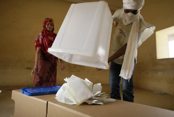 Malian electoral agents count the votes at a polling station in Kidal, northern Mali, on July 28, 2013.