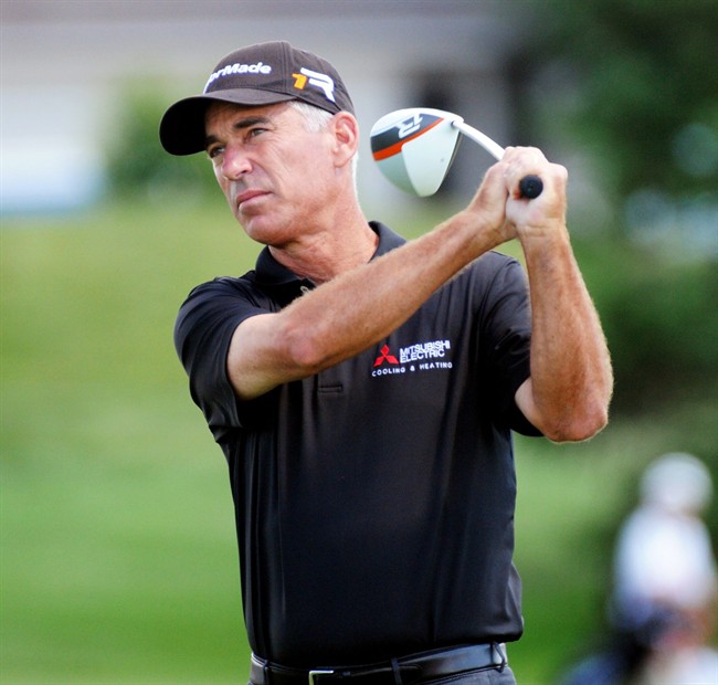 Corey Pavin tees off on the first hole during the second round of the 3M Players Championship golf tournament at TPC Twin Cities golf course Saturday, Aug. 3, 2013, in Blaine, Minn. 