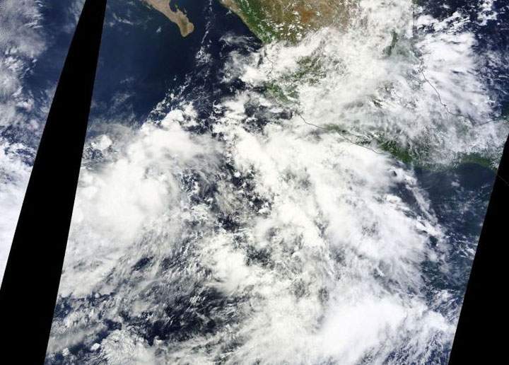 A satellite image of Tropical Depression Nine-E which formed south of Baja California early Thursday.