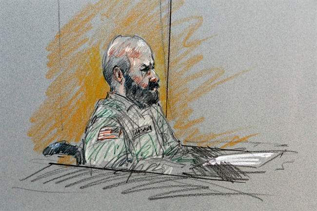 n this Aug. 6, 2013, file courtroom sketch, Maj. Nidal Malik Hasan sits in court for his court-martial in Fort Hood, Texas. 