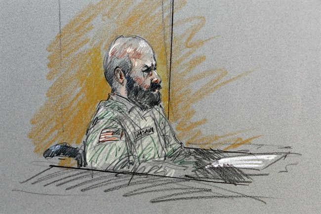 n this Aug. 6, 2013, file courtroom sketch, Maj. Nidal Malik Hasan sits in court for his court-martial in Fort Hood, Texas. 
