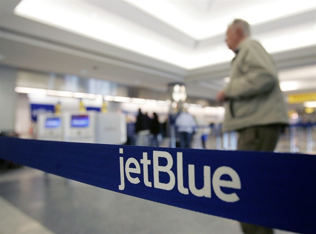 Under pressure from investors and Wall Street analysts, JetBlue has been slowly adopting the practices of other airlines -- moves akin to what Canadian carriers have undertaken in the past couple of years, according to experts.