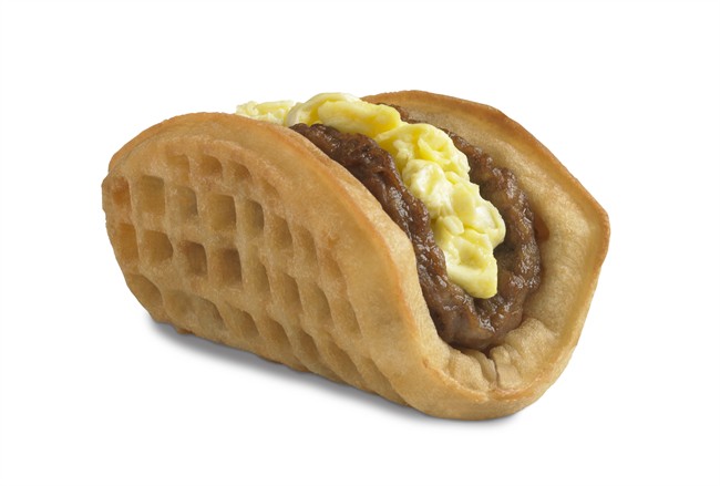 This undated product image provided by Taco Bell, shows the company's new waffle taco. The fast-food chain says the waffle taco, which includes scrambled eggs, sausage and a side of syrup, was the top seller during breakfast hours at the five Southern California restaurants where they were tested earlier this year. (AP Photo/Taco Bell).