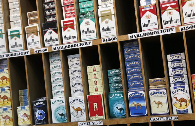 Cigarette packs are displayed at a convenience store in New York, Monday, March 18, 2013. 