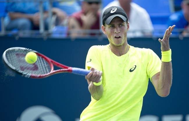 Canada's Vasek Pospisil returns to Radek Stepanek from the Czech Republic during second round of play at the Rogers Cup tennis tournament Wednesday August 7, 2013 in Montreal.