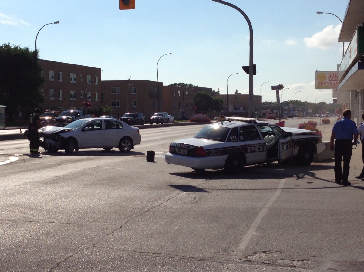 A police car and another vehicle crashed at Portage Avenue and Berry Street on Thursday.