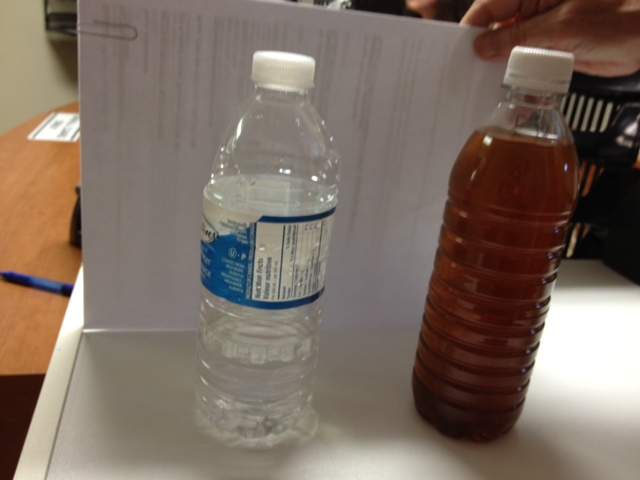 A bottle of brown tap water came from a tap at a Thompson Avenue condo building in Winnipeg, the resident says.