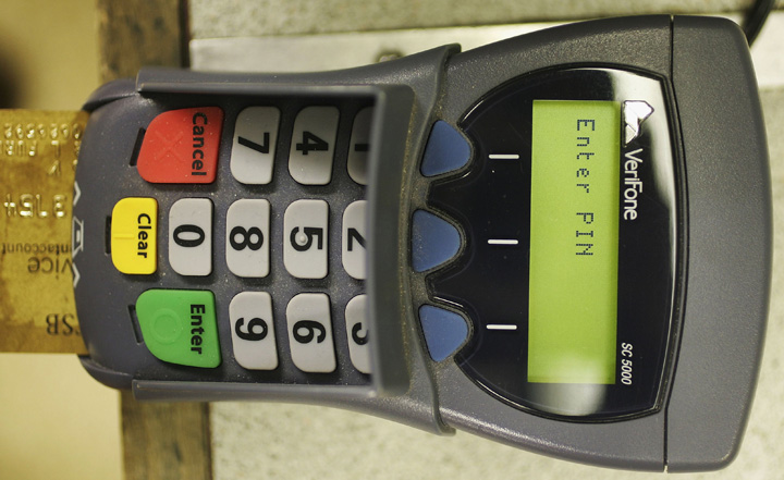 Saskatoon police charge Vancouver men believed to be stealing PIN pad machines across Canada.