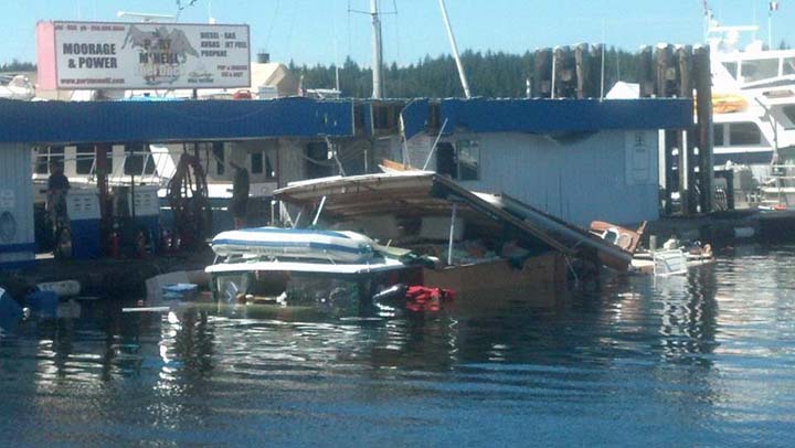 The remnants of a 50-foot boat that exploded while docked at the Port McNeill Fuel Dock and Marina injuring a father and his son on Aug. 5, 2013.