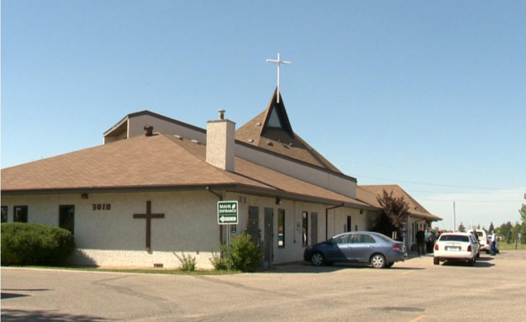 Mourners file into a Regina church on Friday afternoon for the funeral of Lee Bonneau, 6.