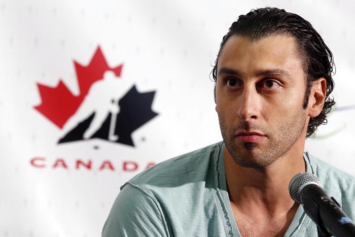 Roberto Luongo speaks to reporters at the Canadian national men's team orientation camp in Calgary, Alta., on Sunday, Aug. 25, 2013. 