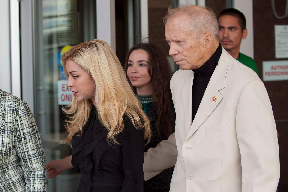 Former Senator Rod Zimmer and his wife Maygan Sensenberger leave provincial court in Saskatoon, Thursday, September 20, 2012.