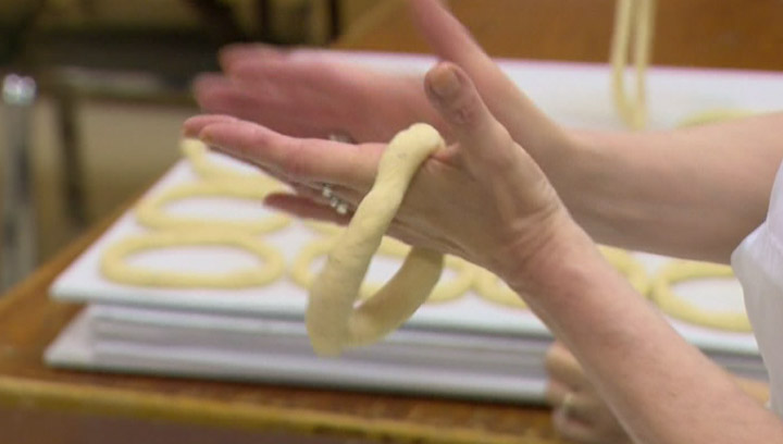 Jessica Kent gets her hands doughy as she learns how to make spudnuts.