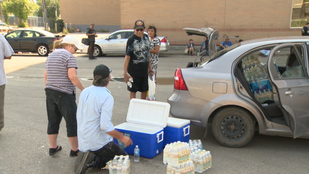 Hundreds of bottles of water were handed out to the city's less fortunate to help beat the heat on Sunday.