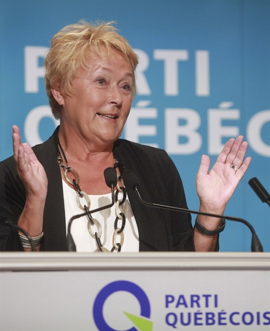 Quebec Premier Pauline Marois gestures as she speaks at the &amp;quot;Universite d'ete des jeunes du Parti Quebecois&amp;quot; event in Quebec City, Sunday, August 25, 2013. 