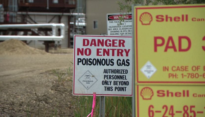 Signs near Peace River in August 2013