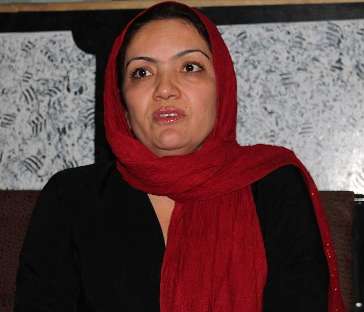 This photograph taken on June 9, 2013 shows Afghan Member of Parliament Fariba Ahmadi Kakar speaking during an interview with an AFP reporter at her residence in Kandahar.