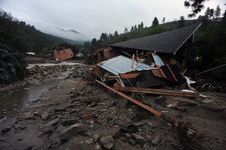 A house lays completely demolished on the side of James Canyon Drive in what was the path of the recent floods that destroyed the town of Jamestown, CO on September 14, 2013.  (Photo By Helen H. Richardson/ The Denver Post)