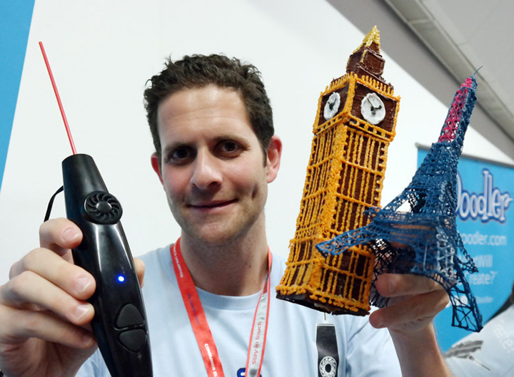 3Doodler Co-Founder Daniel Cowen with creations made with his hot plastic device.