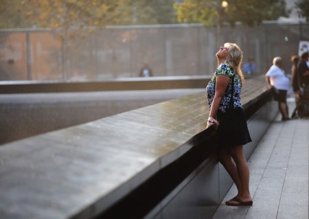 20 powerful and heartbreaking images as thousands mark 12th anniversary ...